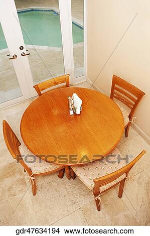 Interiors of a dining room View Large Photo Image Picture - Interiors of a dining room. Fotosearch