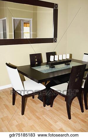 Stock Image - Interiors of a dining room. Fotosearch