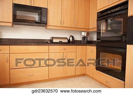Interiors of a kitchen View Large Photo Image Stock Image - Interiors of a kitchen. Fotosearch
