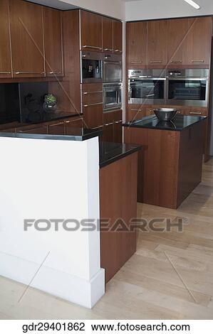Stock Image - Interiors of a kitchen. Fotosearch