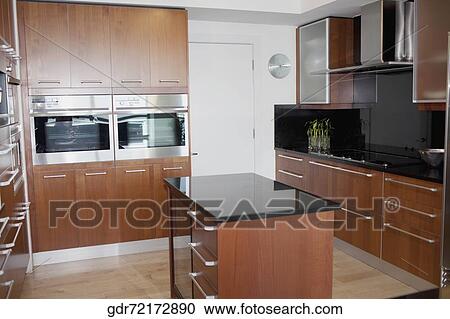 Stock Image - Interiors of a kitchen. Fotosearch