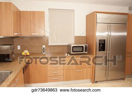 Stock Image - Interiors of a kitchen. Fotosearch