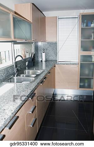 Stock Image - Interiors of a kitchen. Fotosearch
