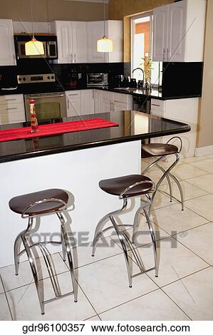 Stock Photo - Interiors of a kitchen. Fotosearch