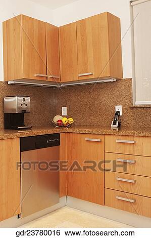 Stock Photograph - Interiors of a kitchen. Fotosearch