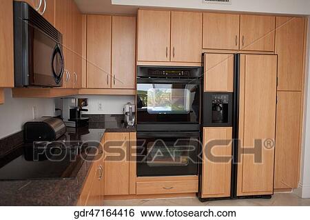 Interiors of a kitchen View Large Photo Image Stock Photograph - Interiors of a kitchen. Fotosearch