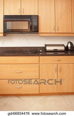 Interiors of a kitchen View Large Photo Image Stock Photograph - Interiors of a kitchen. Fotosearch