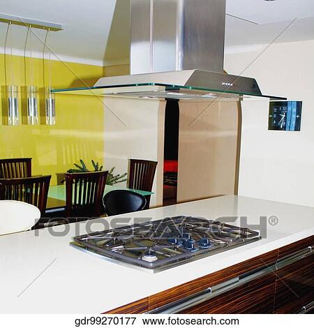 Kitchen counter and dining table in a house View Large Photo Image Stock Photo - Kitchen counter and dining table in a house. Fotosearch