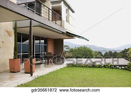 Lawn in front of a house View Large Photo Image Stock Image - Lawn in front of a house. Fotosearch