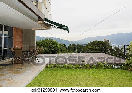 Lawn in front of a house View Large Photo Image Stock Image - Lawn in front of a house. Fotosearch