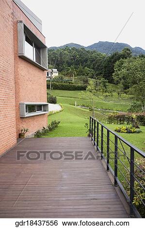 Lawn viewed from a balcony View Large Photo Image Stock Photograph - Lawn viewed from a balcony. Fotosearch