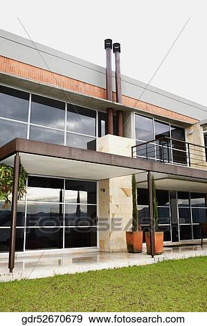 Low angle view of a building View Large Photo Image Stock Photo - Low angle view of a building. Fotosearch