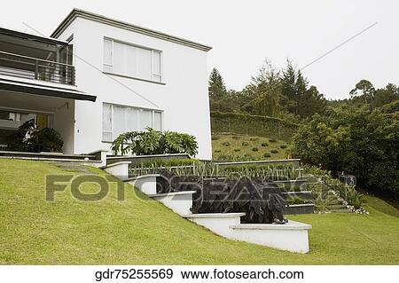 Low angle view of a house View Large Photo Image Stock Photo - Low angle view of a house. Fotosearch