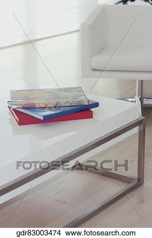 Magazines on a table View Large Photo Image Picture - Magazines on a table. Fotosearch