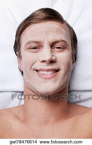 Man with face pack on his face View Large Photo Image Picture - Man with face pack on his face. Fotosearch