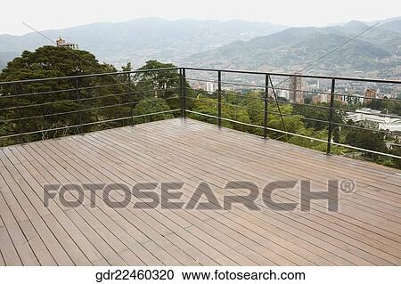 Mountain viewed from the balcony of a house View Large Photo Image Stock Image - Mountain viewed from the balcony of a house. Fotosearch