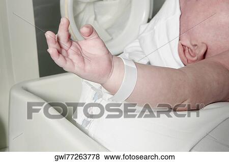 Newborn baby in a hospital View Large Photo Image Stock Photo - Newborn baby in a hospital. Fotosearch