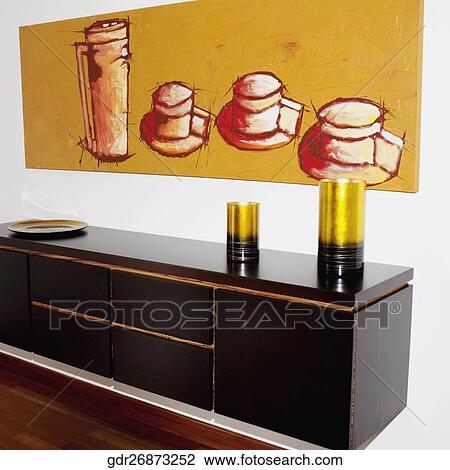 Painting and a dresser in a room View Large Photo Image Stock Image - Painting and a dresser in a room. Fotosearch