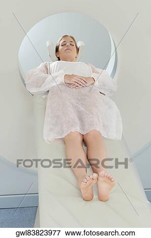 Patient going through an MRI scan View Large Photo Image Stock Photo - Patient going through an MRI scan. Fotosearch
