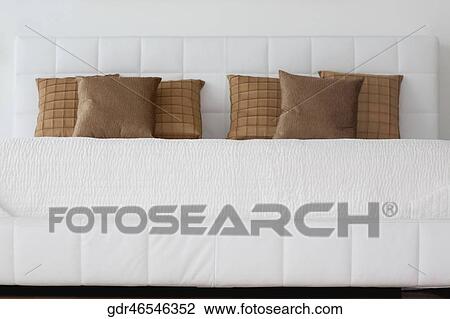 Stock Image - Pillows on the bed. Fotosearch