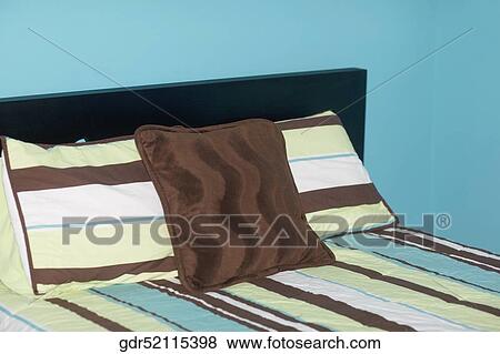 Pillows on the bed View Large Photo Image Stock Photo - Pillows on the bed. Fotosearch