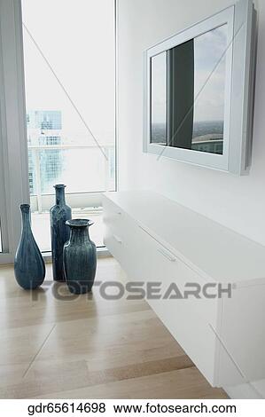 Plasma television in a bedroom View Large Photo Image Stock Photo - Plasma television in a bedroom. Fotosearch