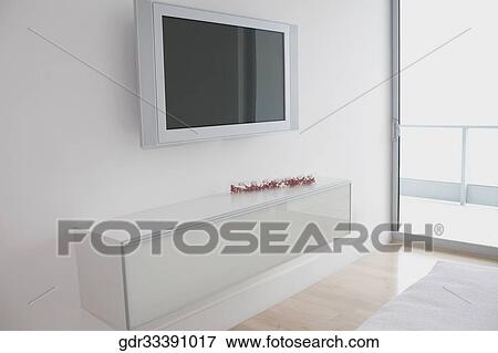 Plasma television in a room View Large Photo Image Stock Photo - Plasma television in a room. Fotosearch