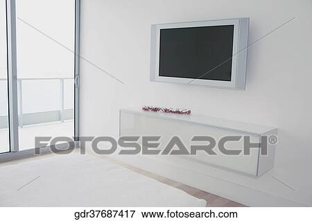 Plasma television in a room View Large Photo Image Stock Photo - Plasma television in a room. Fotosearch