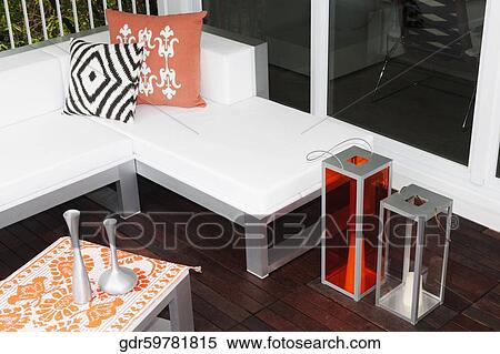 Stock Photography - Porch of a house with furniture. Fotosearch