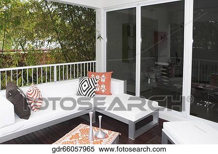 Porch of a house with furniture View Large Photo Image Stock Photography - Porch of a house with furniture. Fotosearch