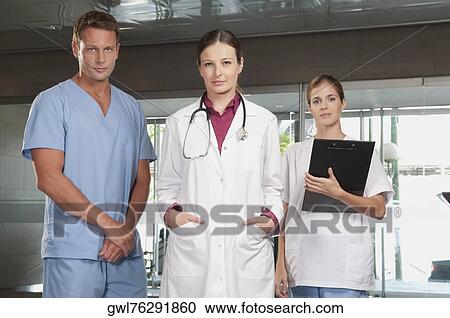 Portrait of a doctor and nurses View Large Photo Image Stock Image - Portrait of a doctor and nurses. Fotosearch