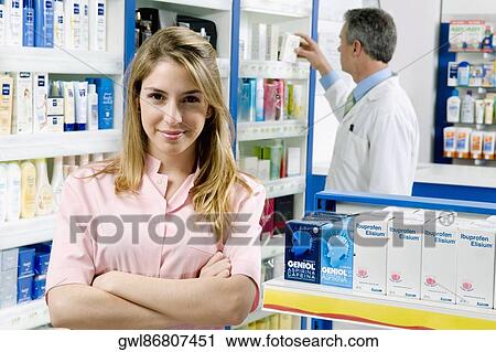 Portrait of a female pharmacist in a pharmacy View Large Photo Image Stock Image - Portrait of a female pharmacist in a pharmacy. Fotosearch