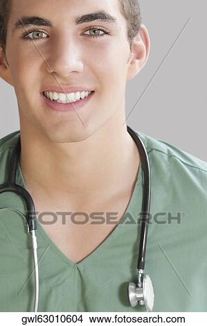 Picture - Portrait of a male nurse smiling. Fotosearch
