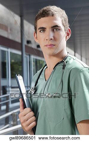 Portrait of a male nurse View Large Photo Image Stock Image - Portrait of a male nurse. Fotosearch