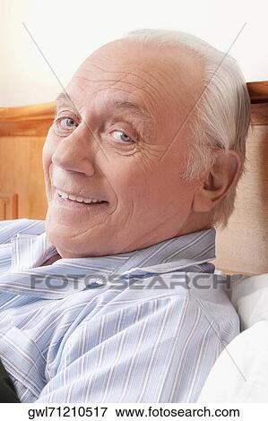 Stock Photo - Portrait of a man smiling. Fotosearch