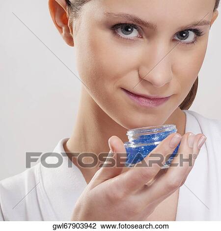 Portrait of a woman smelling aroma gel View Large Photo Image Stock Image - Portrait of a woman smelling aroma gel. Fotosearch