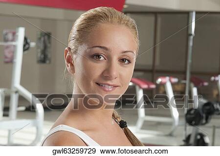 Stock Photo - Portrait of a woman smiling. Fotosearch