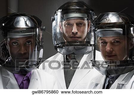 Portrait of doctors wearing protective gear in a laboratory View Large Photo Image Stock Image - Portrait of doctors wearing protective gear in a laboratory. Fotosearch