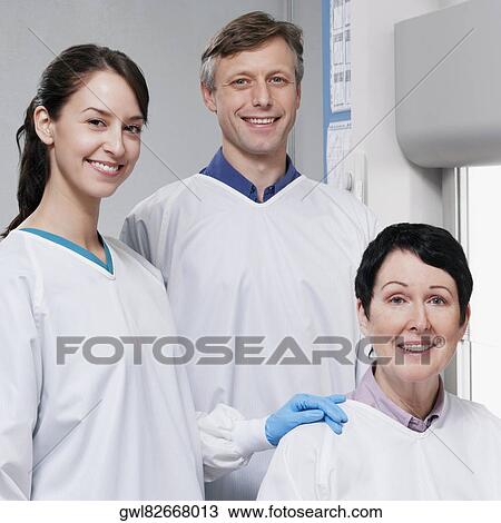 Portrait of three doctors in a laboratory View Large Photo Image Stock Image - Portrait of three doctors in a laboratory. Fotosearch