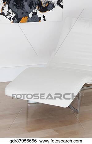 Reclining chair in a room View Large Photo Image Stock Photograph - Reclining chair in a room. Fotosearch