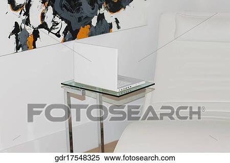 Reclining chair with a laptop View Large Photo Image Stock Photography - Reclining chair with a laptop. Fotosearch