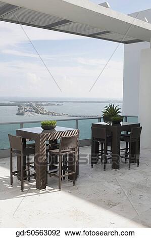Sea viewed through the balcony of a house View Large Photo Image Stock Image - Sea viewed through the balcony of a house. Fotosearch