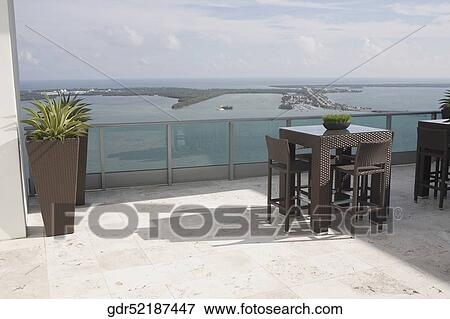 Sea viewed through the balcony of a house View Large Photo Image Stock Photo - Sea viewed through the balcony of a house. Fotosearch