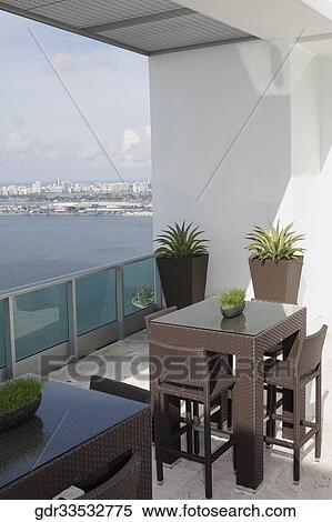 Sea viewed through the balcony of a house View Large Photo Image Stock Photography - Sea viewed through the balcony of a house. Fotosearch