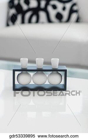 Stock Photography - Showpieces on a table in a living room. Fotosearch