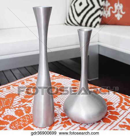 Showpieces on a table on a porch View Large Photo Image Stock Photo - Showpieces on a table on a porch. Fotosearch