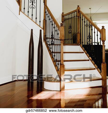 Staircase in a house View Large Photo Image Stock Image - Staircase in a house. Fotosearch