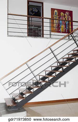 Staircase in a house View Large Photo Image Stock Image - Staircase in a house. Fotosearch