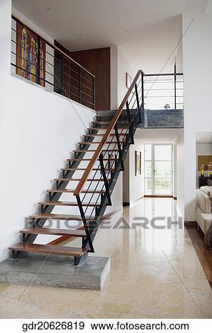 Staircase in a house View Large Photo Image Stock Photo - Staircase in a house. Fotosearch