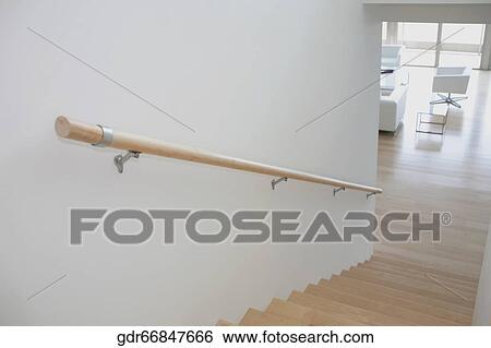 Staircase leading towards a living room View Large Photo Image Stock Photograph - Staircase leading towards a living room. Fotosearch